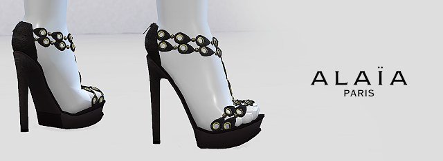 Alaia Eyelet-Embellished Sandals.png